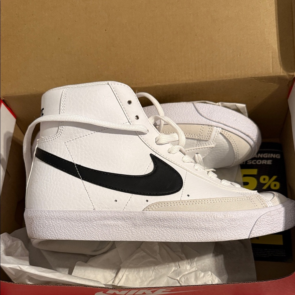 Nike White High-Top Sneakers with Black Swoosh